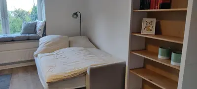 Ein Bett oder Betten in einem Zimmer der Unterkunft Neue Ferienwohnung - Eifel Oase