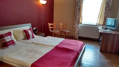 Ein Bett oder Betten in einem Zimmer der Unterkunft Landgasthaus Oberbillig