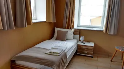 Ein Bett oder Betten in einem Zimmer der Unterkunft Landgasthaus Oberbillig