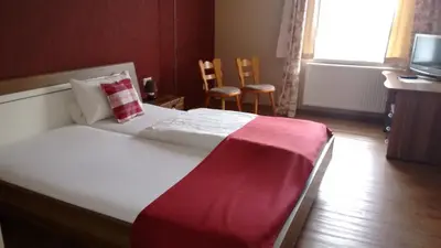 Ein Bett oder Betten in einem Zimmer der Unterkunft Landgasthaus Oberbillig