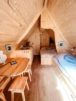 Ein Bett oder Betten in einem Zimmer der Unterkunft Sweet Tiny Cabin Perfect for a Peaceful Nature Escape in Germany