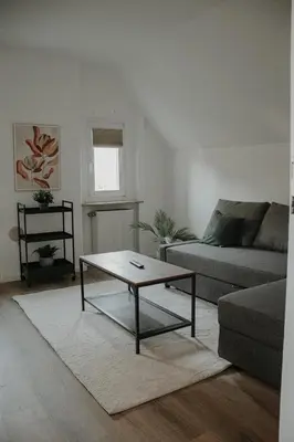 Ein Sitzbereich in der Unterkunft Cozy apartment with a stream view