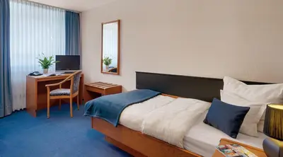 TV/Unterhaltungsangebot in der Unterkunft Motorsport Hotel