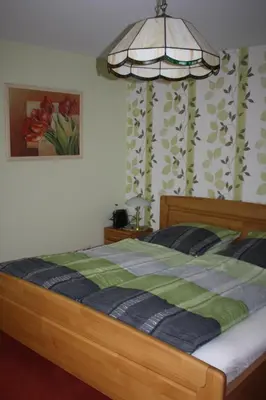 Ein Bett oder Betten in einem Zimmer der Unterkunft Gästewohnung Kurz