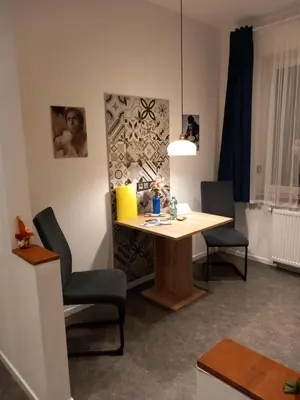 Ein Sitzbereich in der Unterkunft neue Ferienwohnung im roten Haus - Erdgeschoß, nur 350m zur Therme