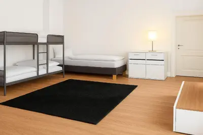 Ein Bett oder Betten in einem Zimmer der Unterkunft Charmante Wohnung in denkmalgeschützter Villa