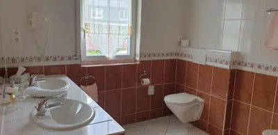 Ein Badezimmer in der Unterkunft Serwazi-Zenzen