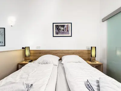 Ein Bett oder Betten in einem Zimmer der Unterkunft Apartment an Mosel und Weingut - KP4