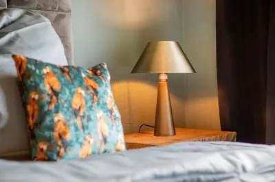 Ein Bett oder Betten in einem Zimmer der Unterkunft MaarChalet Ferienwohnung