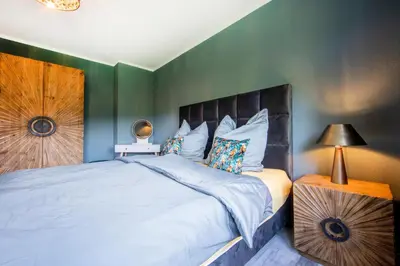 Ein Bett oder Betten in einem Zimmer der Unterkunft MaarChalet Ferienwohnung