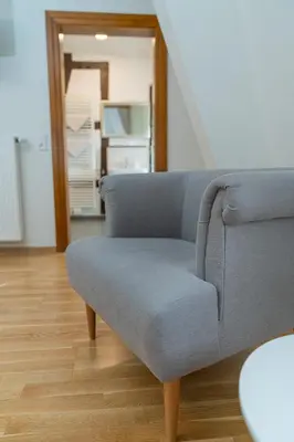 Ein Sitzbereich in der Unterkunft Hotel- Weingut- Moselloreley