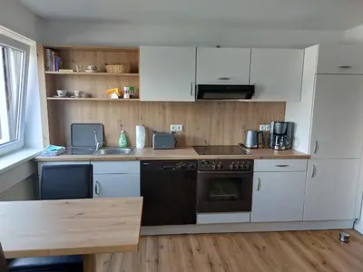 Küche/Küchenzeile in der Unterkunft Ferienwohnung an der Traumschleife