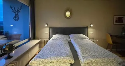 Ein Bett oder Betten in einem Zimmer der Unterkunft #3 Studioapartment mit Loreleyblick direkt an der schönsten Etappe des Rheinsteigs