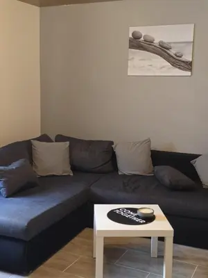 Ein Sitzbereich in der Unterkunft Ferienwohnung an Rhein und Mosel