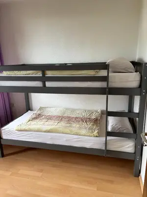Ein Bett oder Betten in einem Zimmer der Unterkunft Ferienwohnung -Freundeskreis- im Taunusblick für bis zu 8 Personen - A402