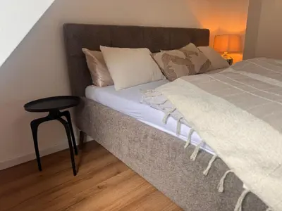 Ein Bett oder Betten in einem Zimmer der Unterkunft theroof