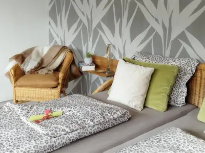 Ein Bett oder Betten in einem Zimmer der Unterkunft Ferienwohnung Moselherz