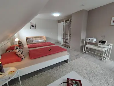 Ein Bett oder Betten in einem Zimmer der Unterkunft Ferienwohnung Moselherz