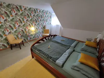 Ein Bett oder Betten in einem Zimmer der Unterkunft Ferienwohnung Moselherz