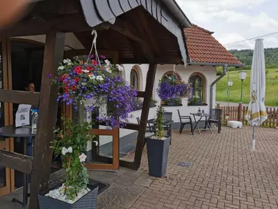 Ein Restaurant oder anderes Speiselokal in der Unterkunft Landhaus am Brubbel