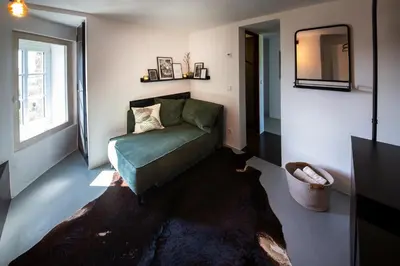 Ein Bett oder Betten in einem Zimmer der Unterkunft EifelturmSuite