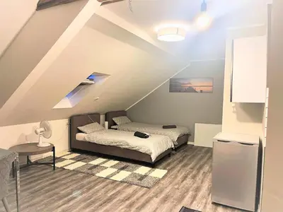 Ein Bett oder Betten in einem Zimmer der Unterkunft Romantic apartment in Pellingen