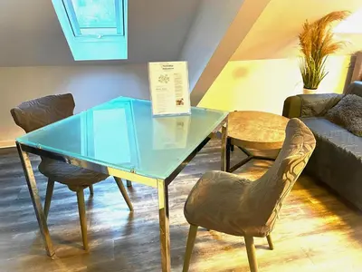 Ein Sitzbereich in der Unterkunft Romantic apartment in Pellingen