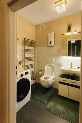 Ein Badezimmer in der Unterkunft StadtLicht Residence l Panorama Balkon