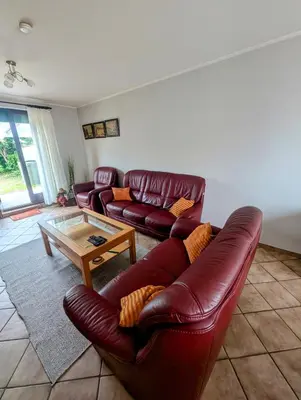 Ein Sitzbereich in der Unterkunft Ferienhaus Thomm