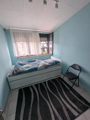 Ein Bett oder Betten in einem Zimmer der Unterkunft Ferienhaus Thomm