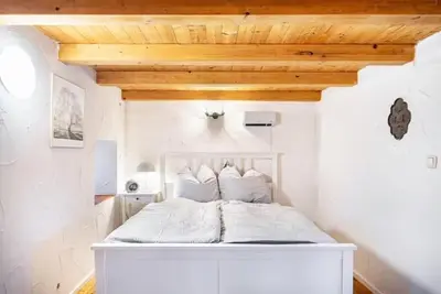 Ein Bett oder Betten in einem Zimmer der Unterkunft Ferienhaus Auf dem Knapp