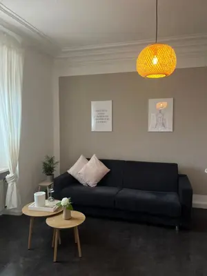 Ein Sitzbereich in der Unterkunft Ferienwohnung Vino 1881