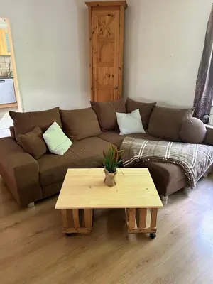 Ein Sitzbereich in der Unterkunft Ranch Apartment