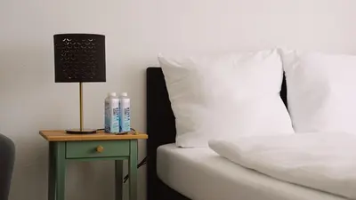 Ein Bett oder Betten in einem Zimmer der Unterkunft Stilvolles Apartment für 4 Gäste