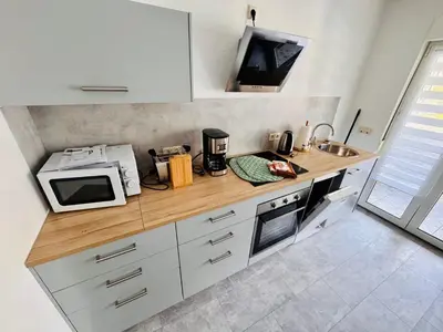 Küche/Küchenzeile in der Unterkunft Ferienwohnung Bienhorntal - Stadtnah - Super Lage