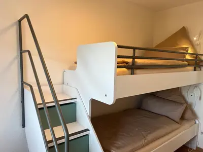 Ein Etagenbett oder Etagenbetten in einem Zimmer der Unterkunft Ferienhaus Limousin