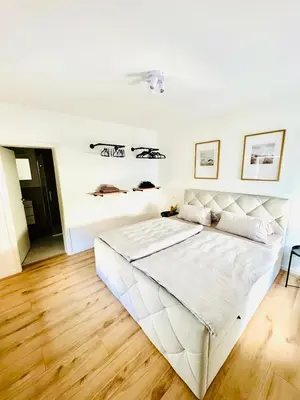 Ein Bett oder Betten in einem Zimmer der Unterkunft Ferienwohnung Stadtflair an der Lahn