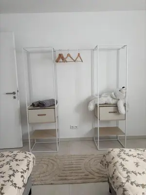 Ein Bett oder Betten in einem Zimmer der Unterkunft Domi Apartment