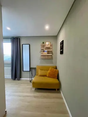 Ein Sitzbereich in der Unterkunft Loreley - Panorama Suite mit Penthouse-Feeling