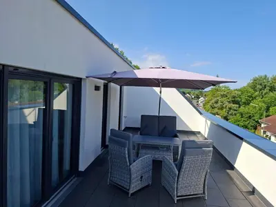 Ein Balkon oder eine Terrasse in der Unterkunft Ferienwohnung Maria - Bitburg