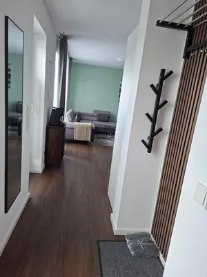Ein Bett oder Betten in einem Zimmer der Unterkunft Ferienwohnung Maria - Bitburg