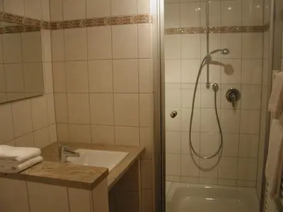 Ein Badezimmer in der Unterkunft Gästehaus