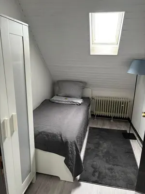 Ein Bett oder Betten in einem Zimmer der Unterkunft Schönes Apartment in der Altstadt