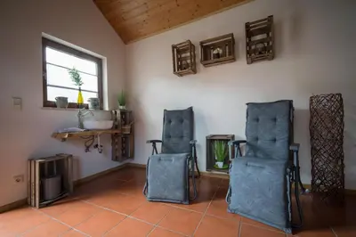 Ein Sitzbereich in der Unterkunft Ferienwohnung Hoffmann