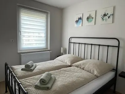 Ein Bett oder Betten in einem Zimmer der Unterkunft Sonne & Mond Apartments