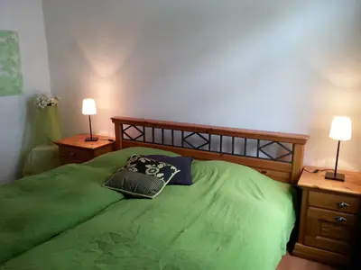 Ein Bett oder Betten in einem Zimmer der Unterkunft Ferienwohnung am Nürburgring