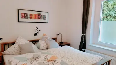 Ein Bett oder Betten in einem Zimmer der Unterkunft Ferienwohnung am Nürburgring