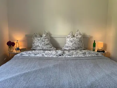 Ein Bett oder Betten in einem Zimmer der Unterkunft Ferienwohnung Utes Stube