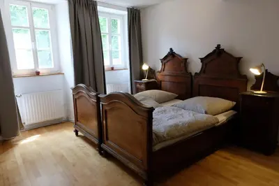 Ein Bett oder Betten in einem Zimmer der Unterkunft Ferienwohnung Fränkischer Hof