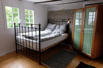 Ein Bett oder Betten in einem Zimmer der Unterkunft Ferienwohnung Fränkischer Hof